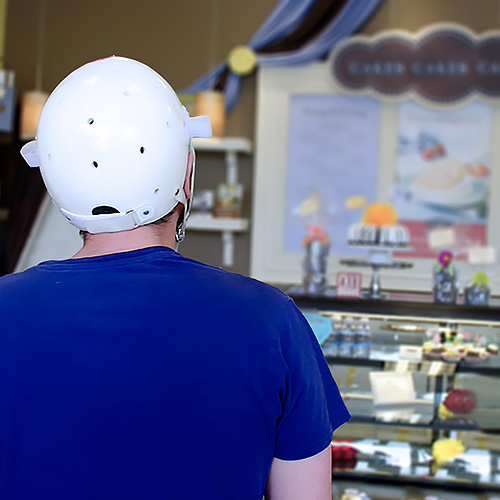 Patient purchasing cake in bakery.