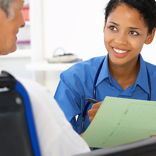 Nurse working with patient.