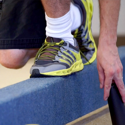 Patient walking on balance beam